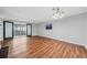 Open floor plan, featuring hardwood floors and glass patio doors at 717 Beaufort Cir, Duluth, GA 30096
