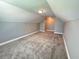 Neutral bonus room, perfect for media or playroom at 8967 Midlothian Ct, Winston, GA 30187