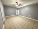 Spacious bonus room with tile flooring and neutral colors at 8967 Midlothian Ct, Winston, GA 30187