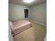 Bedroom featuring neutral tones, carpet, and natural light at 201 Jonquil Spring Rd, Woodstock, GA 30188