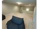This bonus room has plush carpeting, neutral paint, and an overhead light at 201 Jonquil Spring Rd, Woodstock, GA 30188