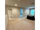 Carpeted bonus room with multiple doorways, recessed lighting, and a window at 201 Jonquil Spring Rd, Woodstock, GA 30188