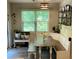 Bright and airy breakfast nook with views of the backyard at 201 Jonquil Spring Rd, Woodstock, GA 30188
