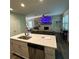 Modern kitchen with a island, stainless steel appliances and an open layout leading to the living area at 201 Jonquil Spring Rd, Woodstock, GA 30188