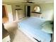 Spacious main bedroom with large bed and dresser, flooded with natural light at 201 Jonquil Spring Rd, Woodstock, GA 30188