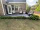 Cozy outdoor patio with comfortable seating, perfect for relaxing and entertaining at 201 Jonquil Spring Rd, Woodstock, GA 30188