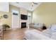 Cozy living room showcasing a fireplace, modern decor, and bright windows for a welcoming space at 3200 Binghampton Ln, Lawrenceville, GA 30044