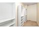 Walk-in closet with multiple shelves and hanging racks, offering ample storage space at 3200 Binghampton Ln, Lawrenceville, GA 30044