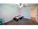 Stylized room featuring a unique car-shaped bed, gray carpet and pastel accent walls, creating a playful space at 5440 Wheeler Ridge Rd, Auburn, GA 30011