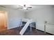 Bright bedroom featuring gray carpet, a built-in loft bed with slide and natural light, creating a fun space at 5440 Wheeler Ridge Rd, Auburn, GA 30011