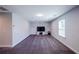 Spacious bonus room featuring plush carpeting, recessed lights, large TV, and cozy atmosphere at 5440 Wheeler Ridge Rd, Auburn, GA 30011