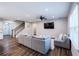 Inviting living room with natural light, plush seating, and hardwood floors, creating a welcoming atmosphere at 5440 Wheeler Ridge Rd, Auburn, GA 30011