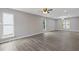 Spacious living room features hardwood floors, recessed lighting, and neutral color palette at 1111 Pin Oak Dr, Tucker, GA 30084