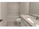 Clean bathroom with tub, toilet, and vanity with granite countertop and ample lighting at 3292 Mill Forest Dr, Conyers, GA 30094