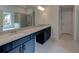 Bathroom featuring a double vanity, a glass shower, and a soaking tub with a view to the outside at 3292 Mill Forest Dr, Conyers, GA 30094