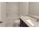 Bright bathroom features a shower-tub combination, a sink with granite countertop and tile flooring at 3292 Mill Forest Dr, Conyers, GA 30094