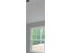Bedroom with a window at 3292 Mill Forest Dr, Conyers, GA 30094