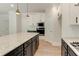 Stylish kitchen with stainless steel appliances, granite countertops, and custom cabinetry at 3292 Mill Forest Dr, Conyers, GA 30094