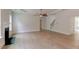 Bright and spacious living room with a fireplace and staircase featuring wood floors at 3292 Mill Forest Dr, Conyers, GA 30094