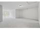 An expansive bonus room with multiple windows to provide plenty of light at 661 Lockton Pl, Sandy Springs, GA 30342