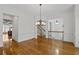 Open dining room with hardwood floors and crown molding at 661 Lockton Pl, Sandy Springs, GA 30342