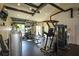 Fitness center with weight machines, free weights, and bright natural light at 661 Lockton Pl, Sandy Springs, GA 30342