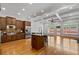 Open kitchen design with granite counters, stainless appliances, and center island at 661 Lockton Pl, Sandy Springs, GA 30342