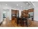 Spacious kitchen with stainless steel appliances, granite island, and hardwood floors at 661 Lockton Pl, Sandy Springs, GA 30342