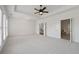 Large main bedroom features multiple windows, and easy access to the bathroom at 661 Lockton Pl, Sandy Springs, GA 30342
