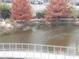 Scenic pond reflecting the surrounding trees, creating a tranquil and inviting outdoor space within the community at 1015 Mcgill Park Ne Ave, Atlanta, GA 30312