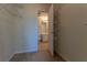 Well-organized walk-in closet offering ample storage space with wire shelving and access to the bathroom at 1015 Mcgill Park Ne Ave, Atlanta, GA 30312