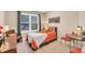 Bedroom showcasing a bed, two chairs and a window creating a peaceful retreat at 4174 Chatham Crest Ln, Buford, GA 30518