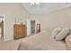 Cozy bedroom with vaulted ceiling, neutral decor, and plush carpeting at 4174 Chatham Crest Ln, Buford, GA 30518