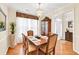 Formal dining room with hardwood floors and decorative chandelier at 4174 Chatham Crest Ln, Buford, GA 30518