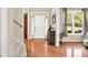 Welcoming foyer with hardwood floors, a large window, and neutral paint at 4174 Chatham Crest Ln, Buford, GA 30518