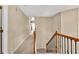 Hallway with wood railing, and carpeting at 4174 Chatham Crest Ln, Buford, GA 30518
