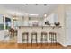 Kitchen with countertop bar and stool seating at 4174 Chatham Crest Ln, Buford, GA 30518