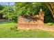 Entrance sign for Chatham Wood Place, featuring a brick structure and established landscaping at 4174 Chatham Crest Ln, Buford, GA 30518