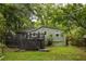 Charming backyard view featuring a large wooden deck perfect for relaxing and entertaining at 1682 Grace Se St, Atlanta, GA 30316