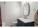 Charming bathroom featuring a sleek vanity with modern fixtures and a stylish mirror at 1682 Grace Se St, Atlanta, GA 30316