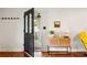 Stylish entryway with hardwood floors, a decorative door, and a modern console table at 1682 Grace Se St, Atlanta, GA 30316