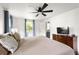 Bright bedroom with soft lighting, ceiling fan, ample space, and natural light, creating a calm retreat at 1682 Grace Se St, Atlanta, GA 30316