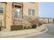 Charming multi-level townhome features a stone and brick facade with inviting staircase at 204 Mahnaz Dr, Atlanta, GA 30331