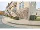 Charming multi-level townhome features a stone and vinyl facade with inviting staircase at 204 Mahnaz Dr, Atlanta, GA 30331