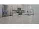 Close-up of kitchen countertop with stainless steel appliances and white cabinets at 204 Mahnaz Dr, Atlanta, GA 30331