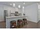 White kitchen with granite countertops, stainless steel appliances, and island with seating at 204 Mahnaz Dr, Atlanta, GA 30331