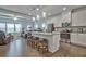 Open kitchen featuring stainless steel appliances, granite countertops, and an island with seating at 204 Mahnaz Dr, Atlanta, GA 30331