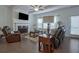 Living room with fireplace, large-screen television, and comfortable leather seating at 204 Mahnaz Dr, Atlanta, GA 30331