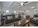 Open-concept living room and kitchen featuring hardwood floors and comfortable seating at 204 Mahnaz Dr, Atlanta, GA 30331