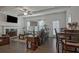 Inviting living room featuring a fireplace, ceiling fan and hardwood floors at 204 Mahnaz Dr, Atlanta, GA 30331
